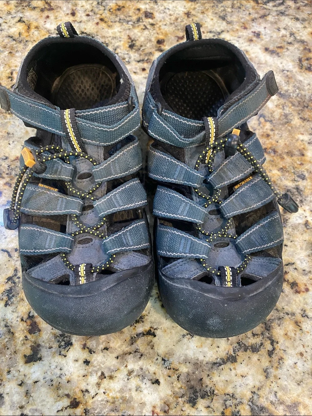 Keen Men's Navy Blue Closed-Toe Outdoor Sandals with Yellow Accents